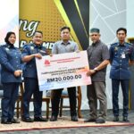 JEMPUTAN KE PERHIMPUNAN BULANAN JULAI 2026 JBPM NEGERI MELAKA DAN PENYERAHAN MOCK CHEQUE PENYAKIT KRTIKAL KEPADA AHLI.